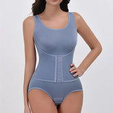 Blue shapewear bodysuit on a model against a plain background
